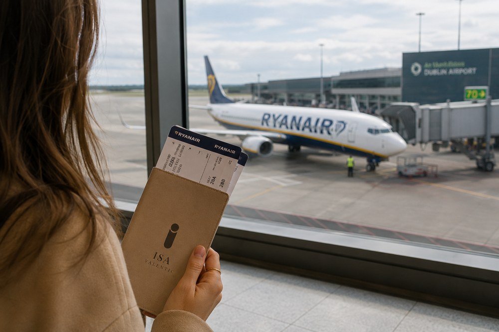 Traveller with boarding pass arriving in Ireland on the path to Stamp 4